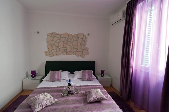 Imagen de la habitación del Apartahotel Kuzma Rooms. Foto 16