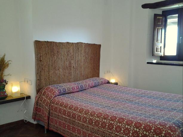 Imagen de la habitación del Apartahotel La Oveja Verde De La Alpujarra Apartamentos. Foto 8