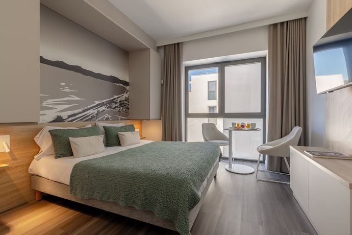 Imagen de la habitación del Apartahotel Lagrange Apart'hotel Les Jardins D'olympie. Foto 13