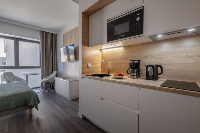 Imagen de la habitación del Apartahotel Lagrange Apart'hotel Les Jardins D'olympie. Foto 14