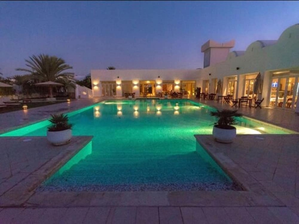 Imagen de la piscina del Apartahotel Les Jardins De Toumana. Foto 19