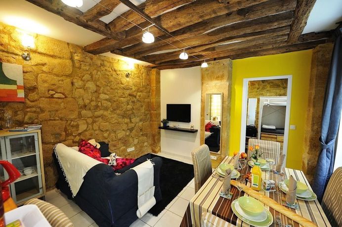 Imagen de la habitación del Apartahotel Les Patios Du Marais. Foto 4