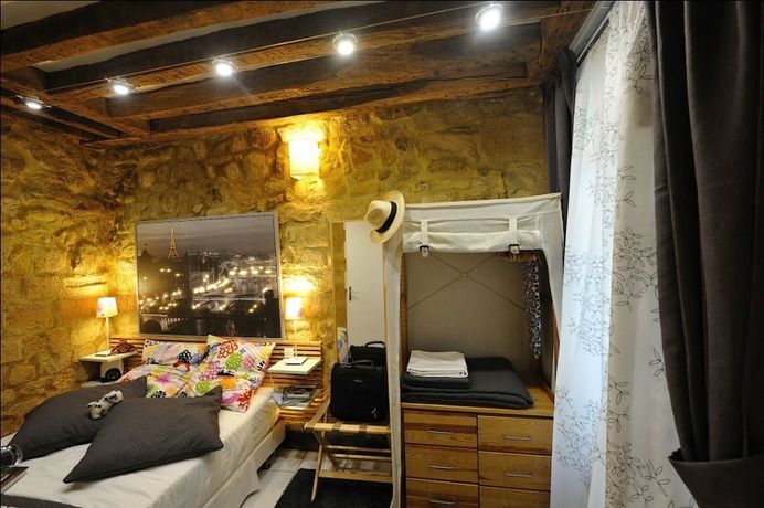 Imagen de la habitación del Apartahotel Les Patios Du Marais. Foto 12