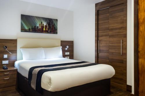 Imagen de la habitación del Apartahotel Livin' Serviced Apartments. Foto 3