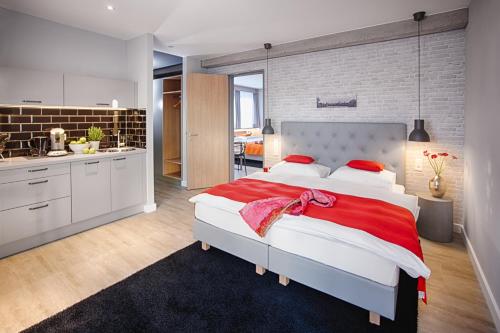 Imagen de la habitación del Apartahotel Mloft Apartments München. Foto 3