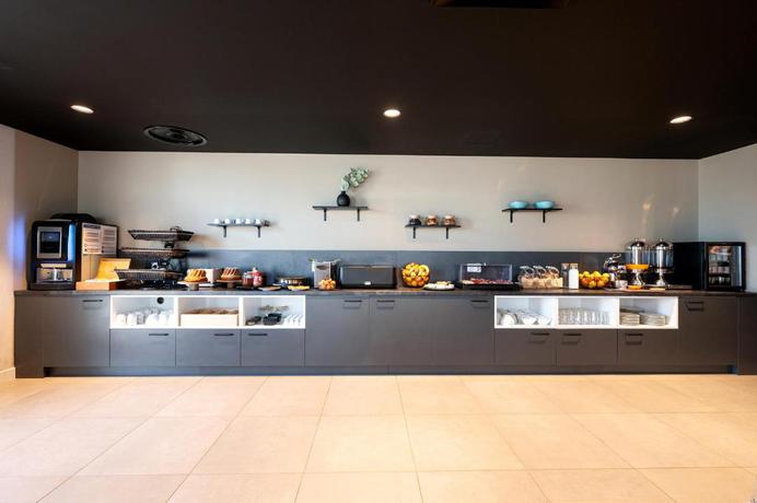 Imagen de los interiores del Apartahotel Nemea Coeur Europe Strasbourg Illkirch. Foto 13