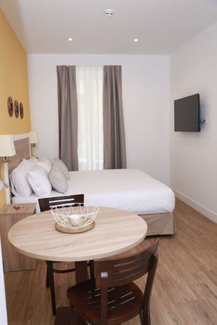 Imagen de la habitación del Apartahotel New Point Opera. Foto 2