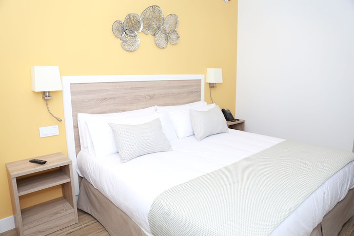 Imagen de la habitación del Apartahotel New Point Opera. Foto 4