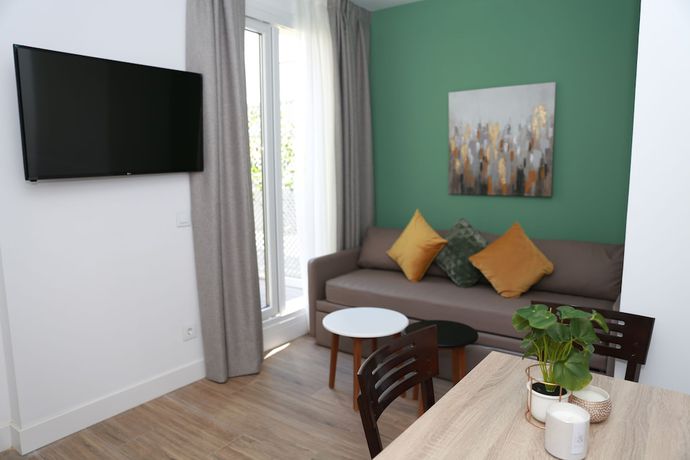 Imagen de la habitación del Apartahotel New Point Opera. Foto 5