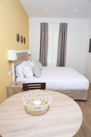 Imagen de la habitación del Apartahotel New Point Opera. Foto 15