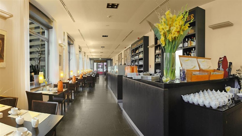 Imagen del bar/restaurante del Apartahotel Numa Berlin Arc. Foto 2