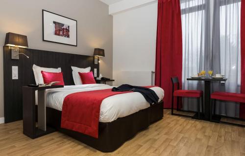 Imagen de la habitación del Apartahotel Odalys City Paris Montmartre. Foto 8