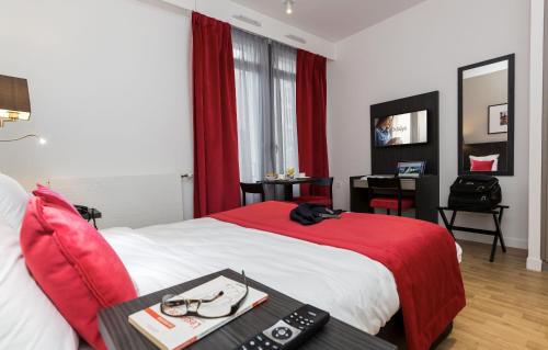 Imagen de la habitación del Apartahotel Odalys City Paris Montmartre. Foto 9