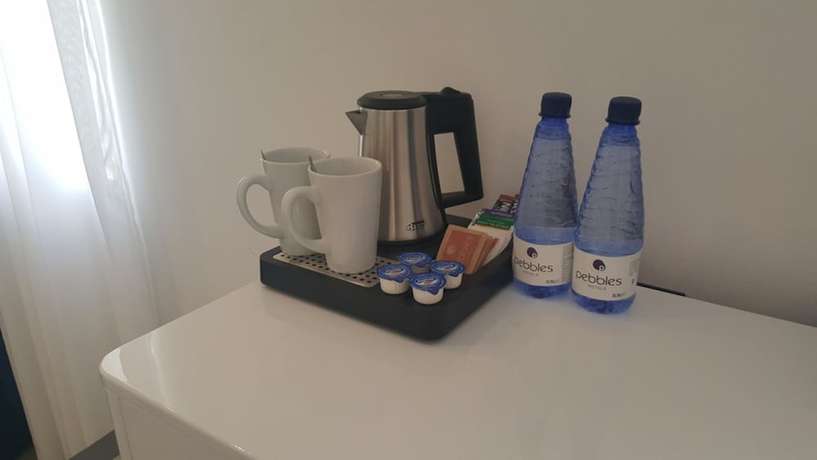 Imagen de la habitación del Apartahotel Pebbles Boutique. Foto 2