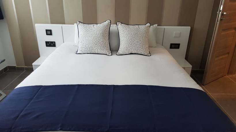 Imagen de la habitación del Apartahotel Pebbles Boutique. Foto 5