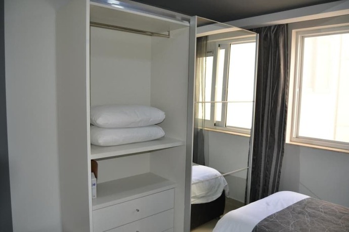 Imagen de la habitación del Apartahotel Pebbles Boutique. Foto 6