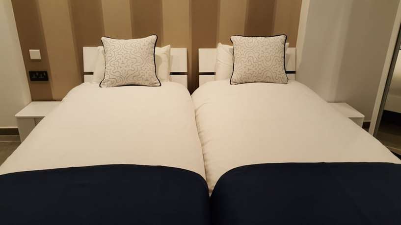 Imagen de la habitación del Apartahotel Pebbles Boutique. Foto 9