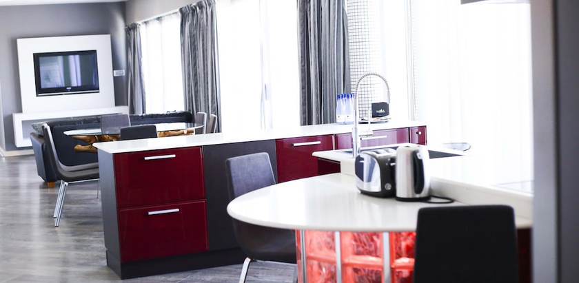 Imagen de la habitación del Apartahotel Pebbles Boutique. Foto 12