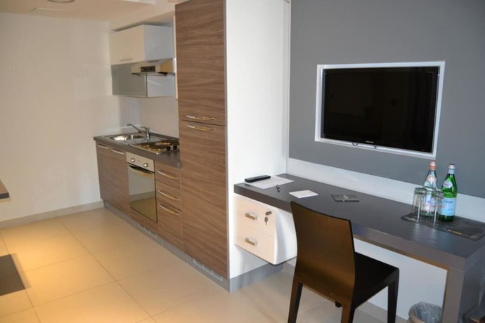 Imagen de la habitación del Apartahotel Pebbles Boutique. Foto 16