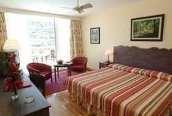 Imagen de la habitación del Apartahotel Pestana Atalaia Ocean Aparthotel. Foto 26