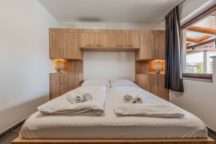 Imagen de la habitación del Apartahotel Plat. Foto 22