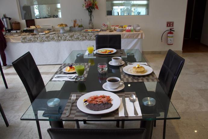 Imagen general del Apartahotel Residence L'heritage Hipólito Taine By Bluebay. Foto 9