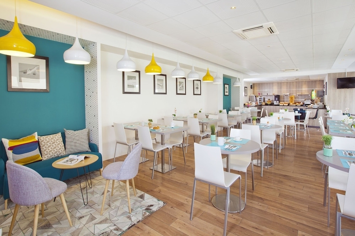 Imagen del bar/restaurante del Apartahotel Residhome Roissy Village. Foto 7