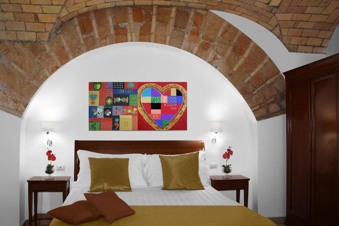 Imagen de la habitación del Apartahotel Roma Resort Colosseum. Foto 10