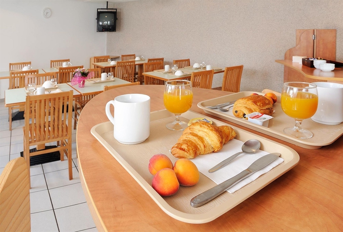 Imagen del bar/restaurante del Apartahotel Séjours Et Affaires Tours Léonard De Vinci. Foto 2