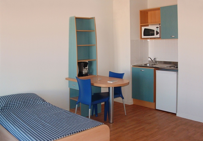 Imagen de la habitación del Apartahotel Séjours and Affaires Poitiers Lamartine. Foto 8