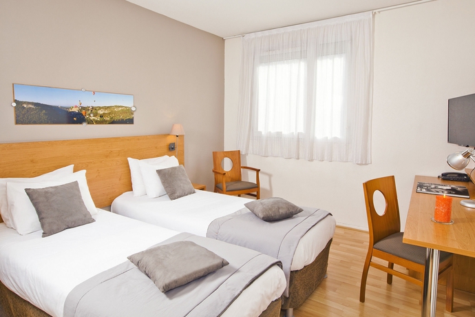 Imagen de la habitación del Apartahotel Sejours and Affaires Toulouse De Brienne. Foto 4