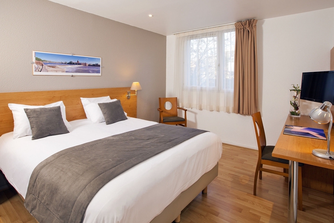 Imagen de la habitación del Apartahotel Sejours and Affaires Toulouse De Brienne. Foto 6