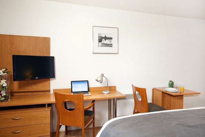 Imagen de la habitación del Apartahotel Sejours and Affaires Toulouse De Brienne. Foto 8