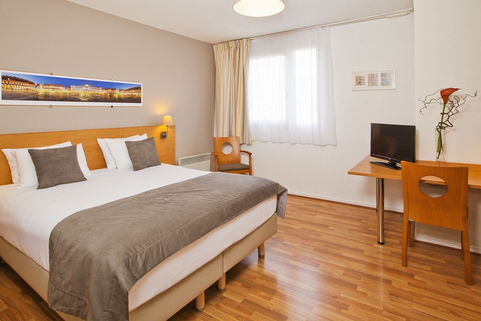 Imagen de la habitación del Apartahotel Sejours and Affaires Toulouse De Brienne. Foto 9