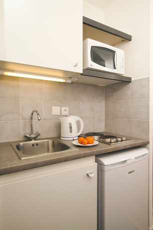 Imagen de la habitación del Apartahotel Sejours and Affaires Toulouse De Brienne. Foto 13