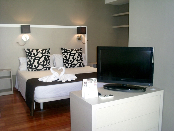 Imagen de la habitación del Apartahotel Senator Barcelona Apartments. Foto 2