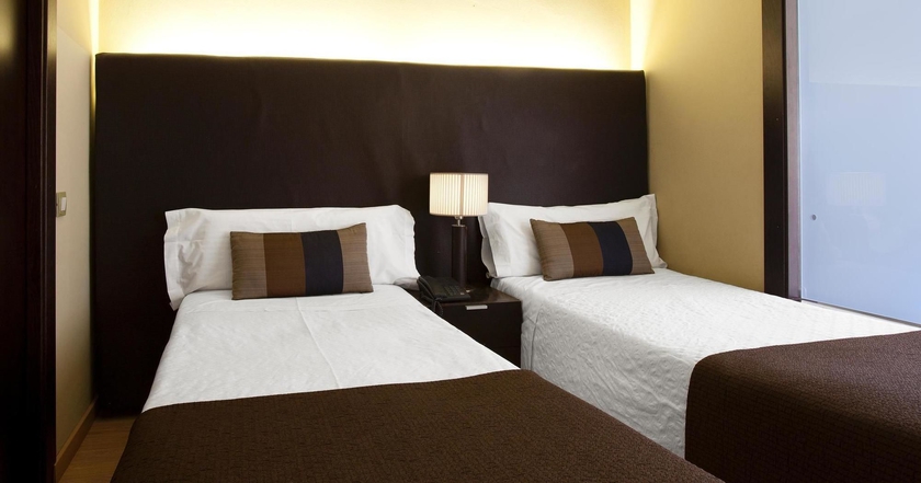 Imagen de la habitación del Apartahotel Senator Barcelona Apartments. Foto 6