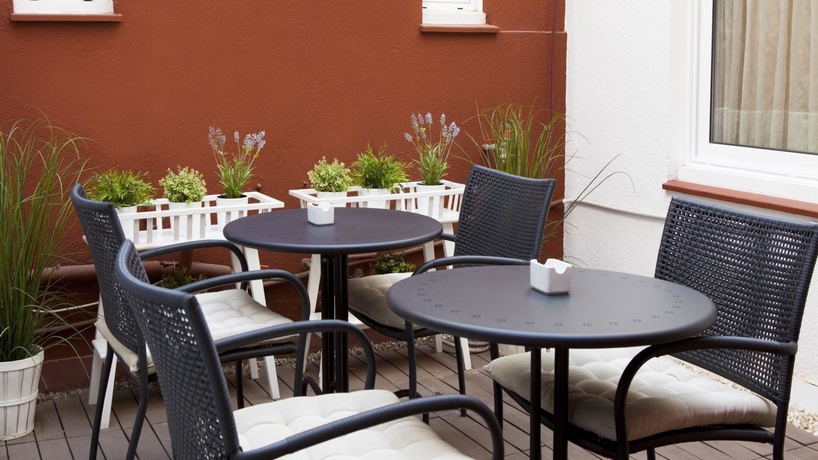 Imagen de la habitación del Apartahotel Senator Barcelona Apartments. Foto 7