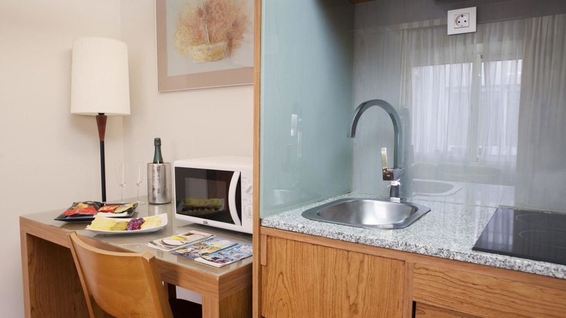 Imagen de la habitación del Apartahotel Senator Barcelona Apartments. Foto 8