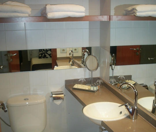 Imagen de la habitación del Apartahotel Senator Barcelona Apartments. Foto 10