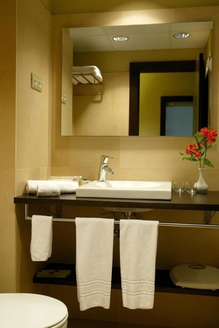 Imagen de la habitación del Apartahotel Senator Barcelona Apartments. Foto 12