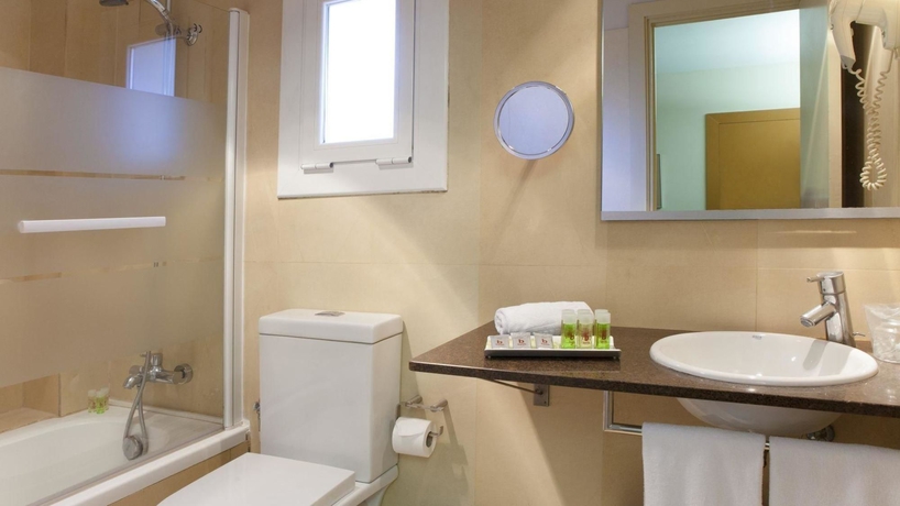 Imagen de la habitación del Apartahotel Senator Barcelona Apartments. Foto 13