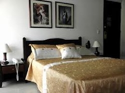 Imagen de la habitación del Apartahotel Sexta Avenida. Foto 2