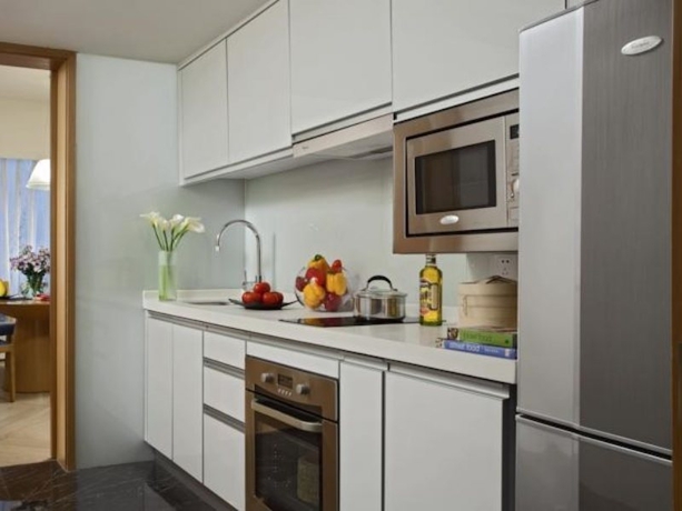 Imagen de los interiores del Apartahotel Somerset Riverview Chengdu. Foto 6