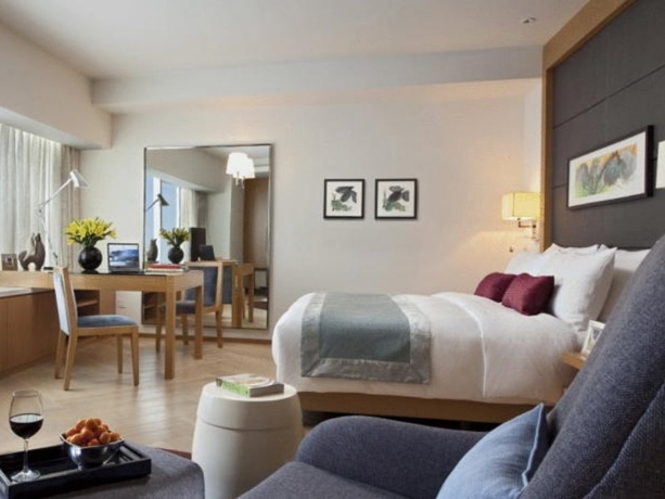 Imagen de la habitación del Apartahotel Somerset Riverview Chengdu. Foto 4