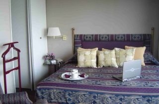 Imagen de la habitación del Apartahotel Suites Michelangelo. Foto 4