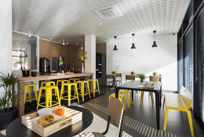 Imagen del bar/restaurante del Apartahotel Ténéo Apparthotel Bordeaux Maritime. Foto 2