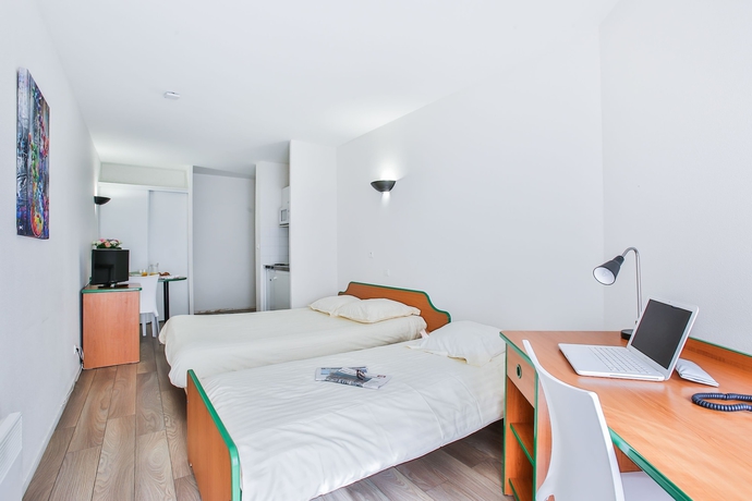 Imagen de la habitación del Apartahotel The Originals R&eacute;sidence, Les Laur&eacute;ades, Clermont-Ferrand. Foto 3