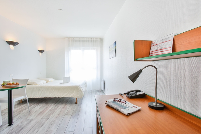 Imagen de la habitación del Apartahotel The Originals R&eacute;sidence, Les Laur&eacute;ades, Clermont-Ferrand. Foto 4