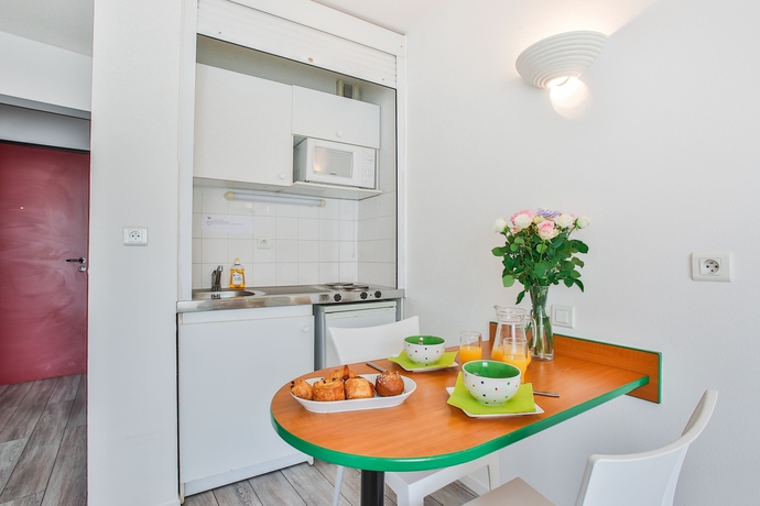 Imagen de la habitación del Apartahotel The Originals R&eacute;sidence, Les Laur&eacute;ades, Clermont-Ferrand. Foto 15